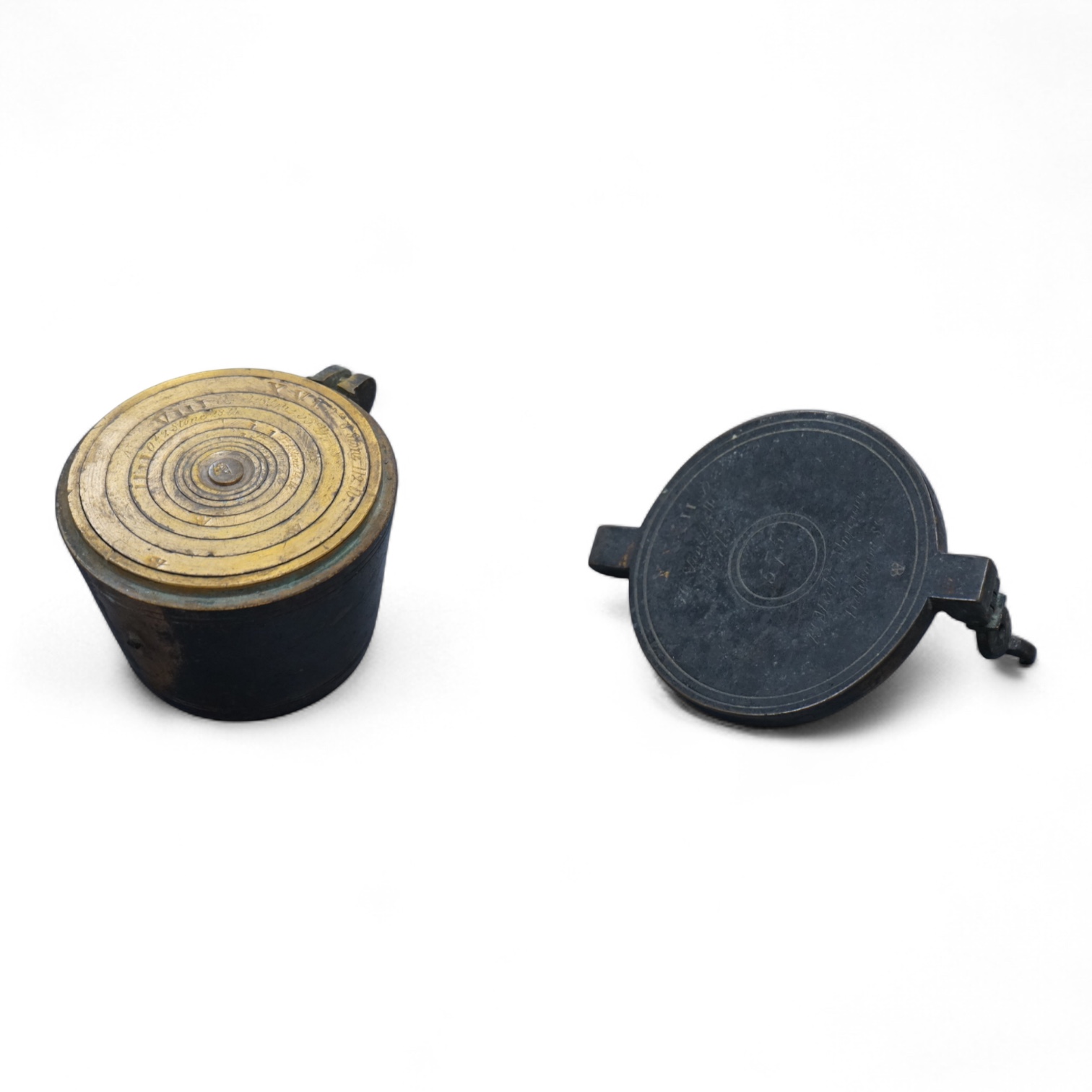 A 19th century brass nest of weights, the case with engraved inscription, 18 stone/4lb, Weeks’s Mechl. Museum, Tichborne St., 10cm wide